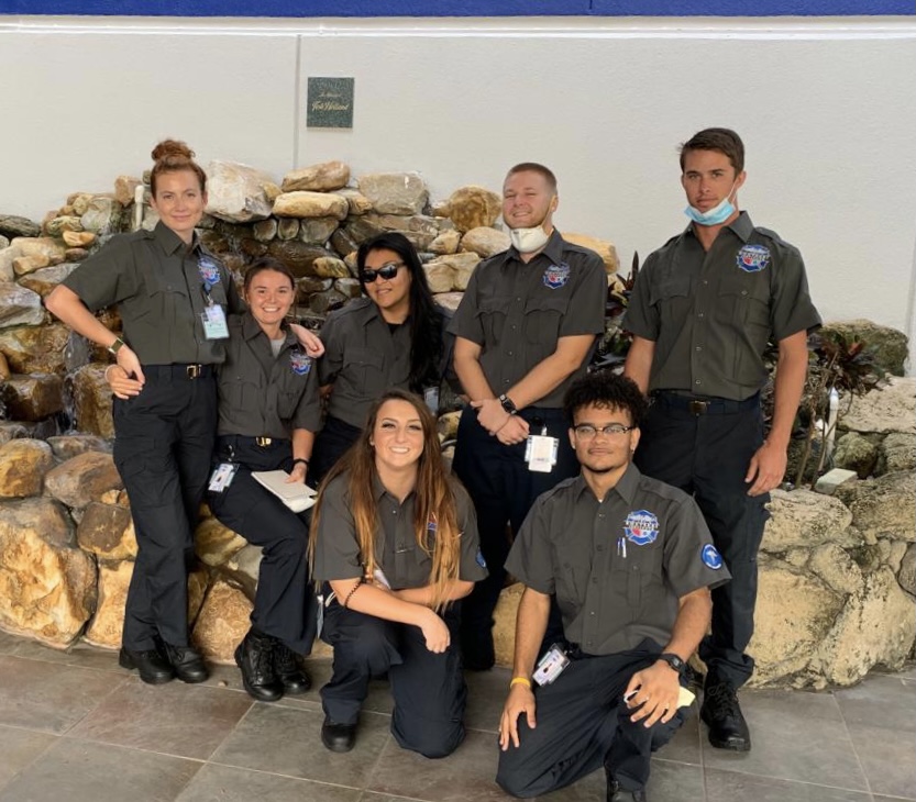 A group of people in uniform posing for the camera.